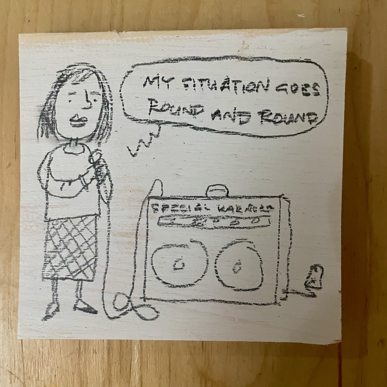 I've been doodling on chunks of scrap wood for fun.