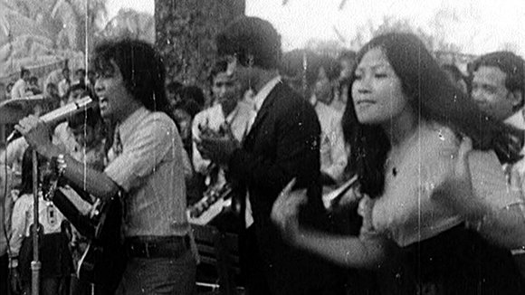 Yol Aularong (left) in performance.