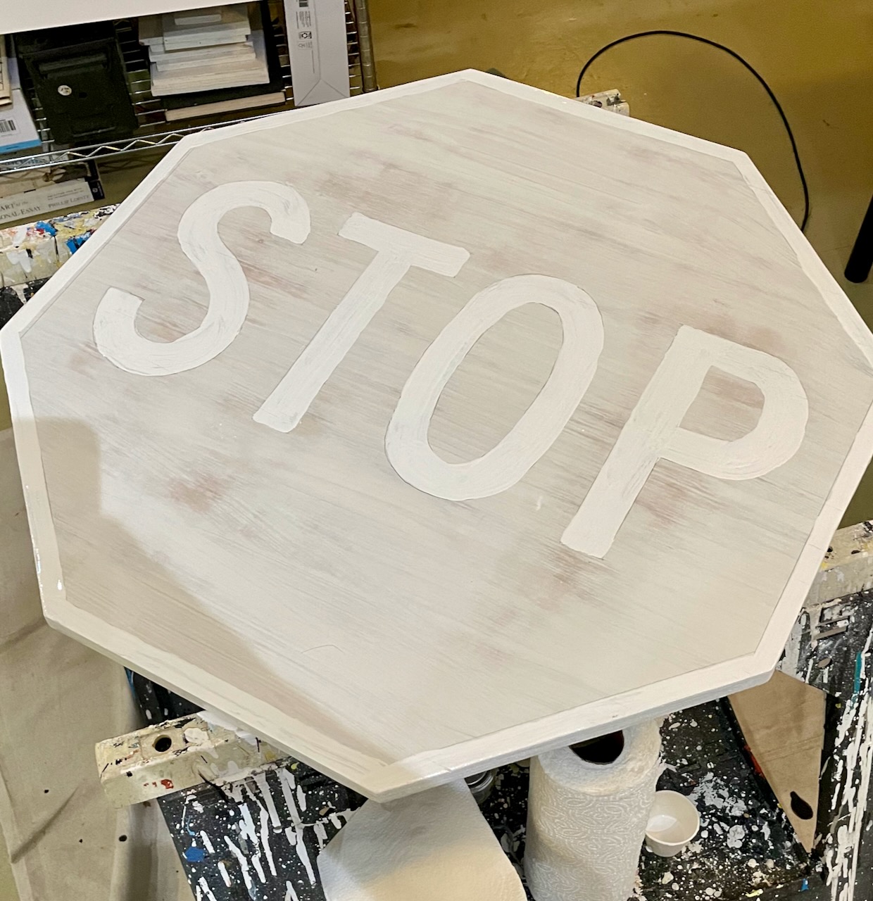 partly-completed stop sign painting by Dave Rhoden