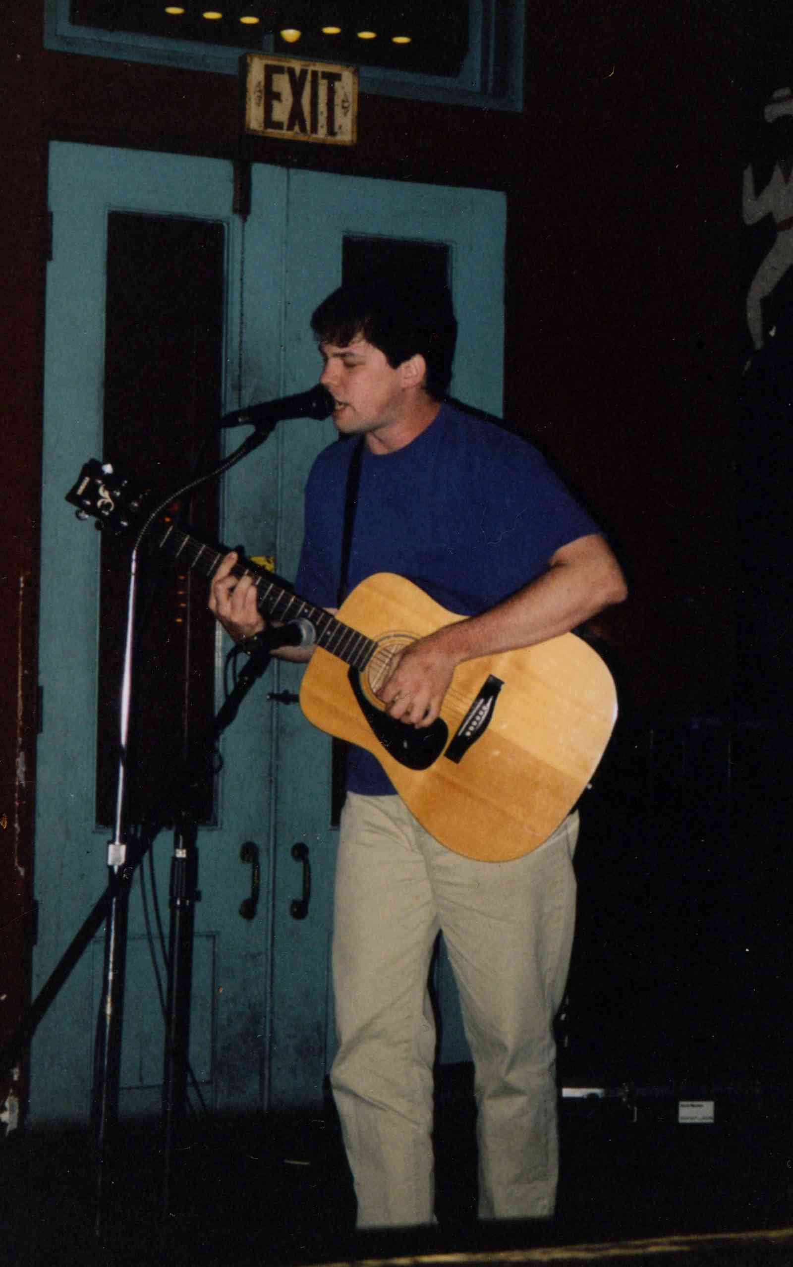 David Rhoden plays an open mic at Checkpoint Charlie