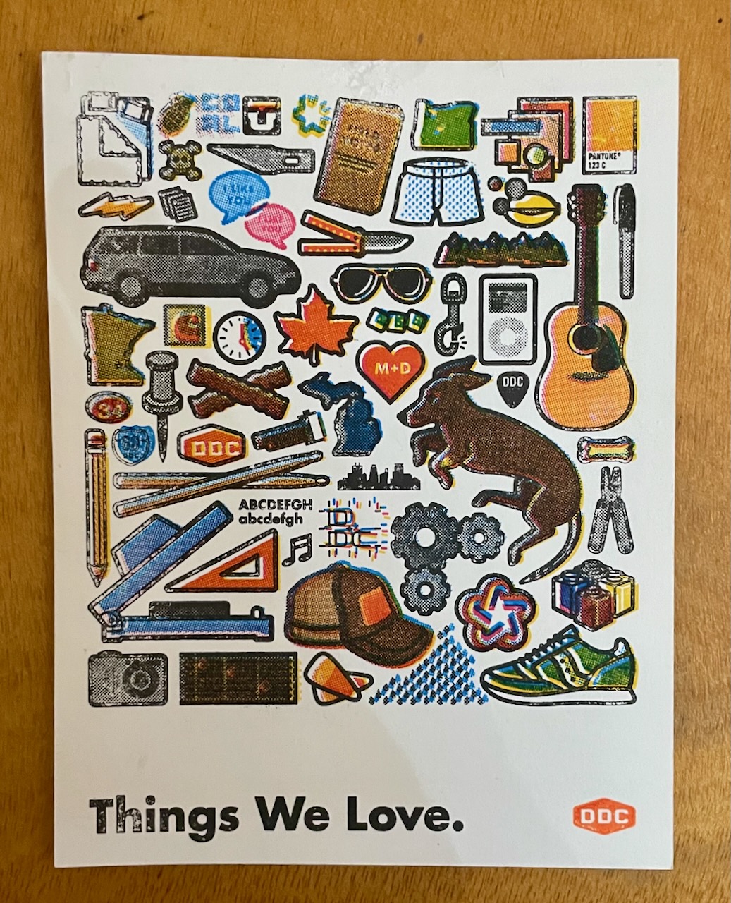 front of Gocco print by Draplin Design Co. labeled Things We Love, with stylized images of things like "a full iPod" and "Draplin trucker hat".
