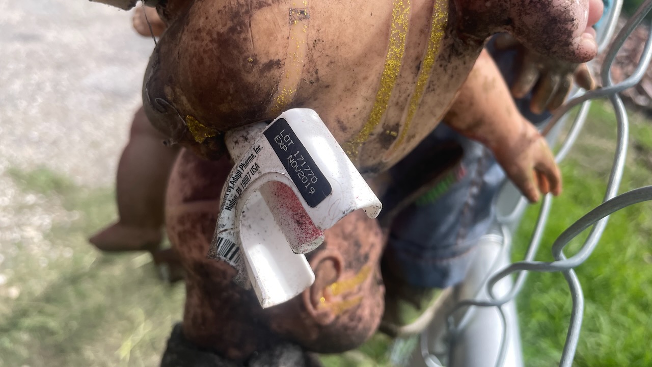 Narcan inhaler stuck in accursèd totem on Tricou Street, Holy Cross, New Orleans. Photo by David Rhoden.