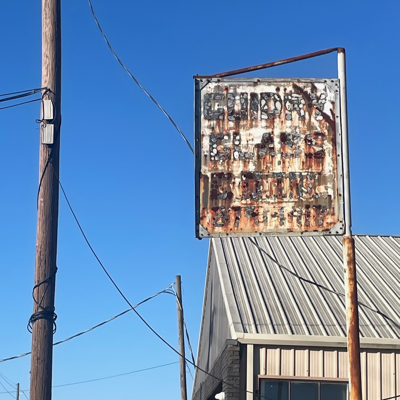 Guidry Glass destroyed sign in Arabi, Louisiana. Photo by Dave Rhoden.