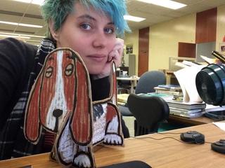 I made a basset hound out of corrugated paper and oil pastels for Ariel.