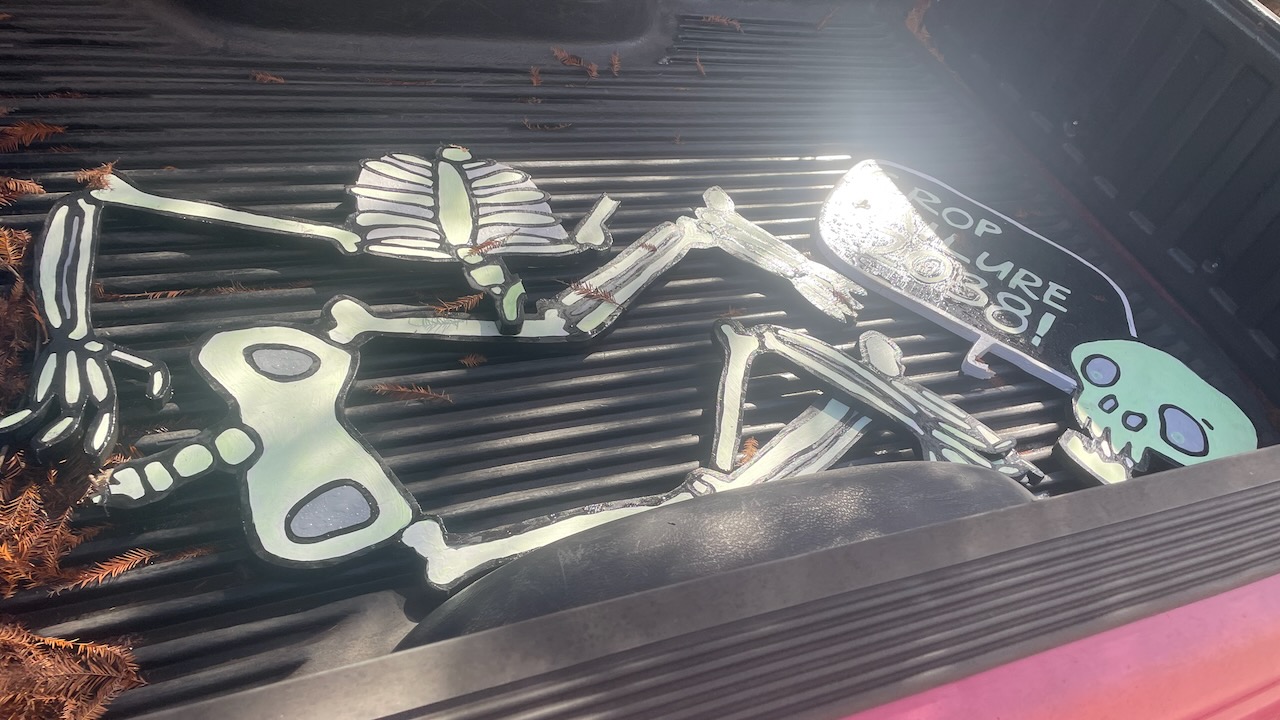 skeleton artwork parts in truck bed