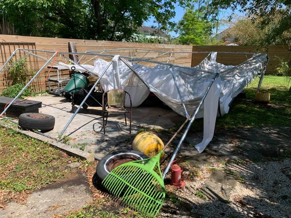 Gina has this wedding tent to work under but maybe it wasn't meant to stay up in real bad weather.